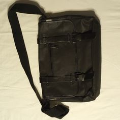 This Bag Measures 16 Inches Long, 12 Inches Tall And 3.5 Inches Wide. It Has Four Pockets (Two With Zippers) And Very Sturdy Clasps. Looks Brand New. Casual Satchel Laptop Bag With Removable Pouch, Casual Black Shoulder Bag For Business, Casual Black Laptop Tote Bag, Casual Tote Shoulder Bag For Business, Casual Business Tote Shoulder Bag, Casual Business Satchel With Zipper Closure, Casual Business Bag With Adjustable Strap, Casual Black Laptop Shoulder Bag, Casual Black Leather Laptop Bag