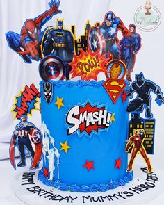 a birthday cake decorated with superheros and the words smash on it's frosting