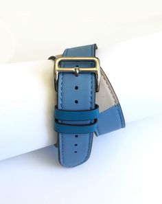 Men's and Women's BLUE  AND CREAM genuine leather strap. Leather strap contains white stitching around entire outer edge. Strap is designed to wrap around the wrist twice creating a solid cuff look. This Apple Watch Band fits all apple series watches sized 42/44mm. Fits wrist sizes 6.5-8 Apple Watch Bands Leather, Leather Wraps, Phone Numbers, Apple Watch Bands, Blue Man, Apple Watch, Watch Bands, Leather Straps, Genuine Leather