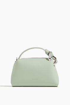 JW Anderson Top Handle Bags Corner Bag in Mint Modern Shoulder Bag With Chain Strap And Top Handle, Chic Satchel With Chain Strap And Top Handle, Chic Bag With Chain Strap And Round Handle, Chic Shoulder Bag With Chain Strap And Round Handle, Chic Bags With Chain Strap And Round Handle, Spring Staples, Small Buckets, Spring Accessories, Jw Anderson