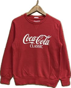 Winter Cotton Tops With Logo Lettering, Casual Long Sleeve Sweatshirt With Logo Lettering, Casual Long Sleeve Top With Logo Lettering, Casual Cotton Sweatshirt With Logo Lettering, Casual Winter Tops With Logo Lettering, Casual Logo Print Sweats For Sports Season, Cotton Sweats With Logo Print For Sports Season, Cotton Logo Print Sweatshirt, Crew Neck Logo Print Sweats Sportswear