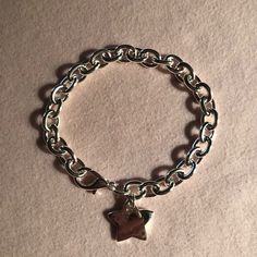 Stunning Nwot 925 Sterling Silver Star Bracelet! One Side Of Star Is Shiny & One Reads 925. Some Pics May Show Reflection Of My Phone But Both Sides Of Star Are Shiny. Can Be Used As A Charm Bracelet Or A Regular Bracelet. Metal Chain Bracelet With Star Charm As Gift, Silver Star-shaped Adjustable Chain Bracelet, Silver Adjustable Chain Bracelet With Star Charm, Adjustable Silver Star-shaped Chain Bracelet, Adjustable Silver Chain Bracelet With Star Charm, Nickel-free Silver Star Bracelet, Elegant Silver Star Chain Bracelet, Elegant Silver Star-shaped Chain Bracelet, Silver Chain Bracelet With Star Charm As Gift