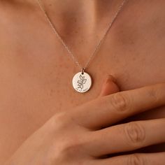 Introducing our stunning 18k Gold Birth Month Flower Necklace, featuring a delicate Engraved Birth Month Disc. This piece of Everyday Imprinted Jewelry is perfect for adding a touch of elegance to any outfit. The Graceful Everyday Imprinted Necklace is a must-have for those who appreciate both beauty and meaning in their accessories. Handcrafted with care, this necklace is a unique and thoughtful gift for yourself or a loved one. Super Features: * Your Birth Month Blooms: Show off your birth flo Gold Round Pendant With Birth Flower, Nature-inspired Round Birth Flower Necklace, Gold-plated Birth Flower Necklaces, 14k Gold-filled Necklace With Birth Flower Round Pendant, Nature-inspired Birth Flower Pendant Jewelry, Tiny Pendant, Engraved Pendant, Best Gifts For Her, Disc Pendant