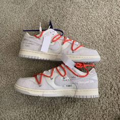 ***Purchased From Snkrs*** This Off-White X Nike Dunk Low Is Taken From The ‘Dear Summer’ Collection, A Sprawling Follow-Up To Virgil Abloh’s First Nike Dunk Collaboration From 2019. The Low-Top Makes Use Of A White Leather Upper With Soft Grey Suede Overlays, Along With Virgil Abloh’s Calling-Card Flourishes, Which Include A Plastic Zip Tie And Printed Helvetica Text. Contrasting Pops Of Color Arrive Via The Sneaker’s Secondary Lacing System, Zip-Tie, An Exposed-Foam Tongue And A Rectangular Ta Off White Sneakers For Streetwear, Nike Off White Low-top Sneakers, Nike Off White Sneakers With Round Toe, Off White X Nike, Calling Card, Zip Ties, Grey Suede, Virgil Abloh, Nike Dunk Low