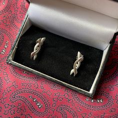 Please note next postage date for January: Monday 8th January and daily thereafter. Happy New Year! A beautiful pair of vintage earrings in a delightful design with a matte and shiny finish and featuring tiny diamonds.  Marked 925. Marked HDIA/I. Weight 2.08g. Diamonds fully tested. They are in great vintage condition but all my items are vintage and will show normal signs of previous wear. I add items to my little shop every week.  If you have any questions or would like further information the Vintage Silver Earrings, White Gold Hoop Earrings, White Gold Hoops, Vintage Silver Rings, Pretty Star, Tiny Diamond, Lovely Earrings, Beautiful Heart, Star Designs