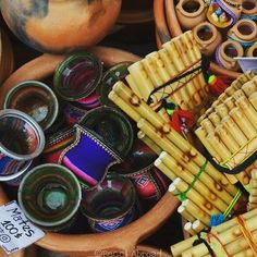 an assortment of decorative items displayed in baskets