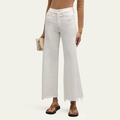 FRAME "Le Palazzo Crop" jeans featuring a raw hem and contrast stitching in white denim  Approx. 10.5" rise; 29" inseam; 14.75" outseam High rise Five-pocket style Loose fit Cropped length Button/zip fly; belt loops Cotton Machine wash cold Imported White Denim Flare Jeans With Frayed Hem, White High-rise Cropped Jeans With Frayed Hem, High Rise White Cropped Jeans With Frayed Hem, White High Rise Cropped Jeans With Frayed Hem, White Mid-rise Jeans With Frayed Hem, White Wide Leg Jeans With Frayed Hem, White Cropped Jeans With Frayed Hem For Fall, White Mid-rise Cropped Jeans With Frayed Hem, White High-rise Flare Jeans With Frayed Hem