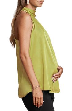 From professional to casual, pull your bump-centric looks together effortlessly with this halter blouse cut from silky satin. 28" length Halter neck with ties Sleeveless, with cutaway shoulders 100% polyester Machine wash, tumble dry Imported Spring Satin Halter Top, Spring Satin Stretch Halter Top, Spring Sleeveless Satin Halter Top, Spring Satin Sleeveless Halter Top, Satin Sleeveless Halter Top For Spring, Summer Sleeveless Satin Blouse, Sleeveless Satin Blouse For Summer, Spring Satin Halter Neck Top, Summer Satin Sleeveless Blouse