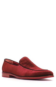 A dapper loafer crafted from luxe velvet is set on a bold sole for statement style. Cushioned footbed Velvet upper/leather lining/rubber sole
 Imported Red Slip-on Loafers With Plain Toe, Red Round Toe Slip-ons For Formal Occasions, Red Formal Slip-ons With Round Toe, Burgundy Slip-on Loafers With Red Sole, Red Moc Toe Dress Shoes For Formal Occasions, Red Slip-on Loafers With Textured Sole, Red Textured Sole Slip-on Loafers, Red Suede Loafers For Formal Occasions, Red Round Toe Formal Slip-ons