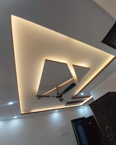 the ceiling is decorated with modern lighting