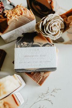 Indulge in the warm, earthy scent of the Sandalwood Soap Bar by SOAK Bath Co. This luxurious soap features a rich, woodsy scent profile with a hint of sweet, spice and musk for a truly captivating aroma. We were Inspired by the scent notes of sandalwood to create this soap bar and chose a warm pink hue made with natural pink clay and black tones made from activated charcoal. The Sandalwood Soap Bar is perfect for everyday use or as a thoughtful gift for anyone who loves a musky, woodsy scent. SOAK Bath Co is a woman-owned brand based in Manitoba, Canada. Each of our products is handmade by our local team of women in our Canadian studio with all-natural, vegan-friendly ingredients. We believe in creating sustainable, eco-friendly products that make the best gifts and feel great using on you Sandalwood Soap, Grow Wildflowers, Bath Melts, Soap Labels, Manitoba Canada, Black Tones, Mini Soaps, Best Cleaning Products, Scent Notes