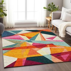 a brightly colored area rug in a living room