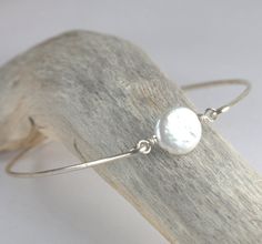 White Pearl Sterling Silver Bangle Bracelet by TheresaRose on Etsy, $18.00 Pearl Bangle Bracelet, Silver Bangle Bracelet, Pearl Bangle, Bracelet Pearl, Sterling Silver Bangle Bracelets, Sterling Silver Bangle, Sterling Silver Bangles, Silver Bangle, Bangles Jewelry