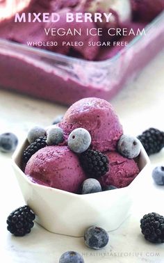 mixed berry vegan ice cream in a bowl with berries