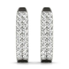 These Shiloh Earrings add a touch of sparkle to any outfit. With 1/4cwt of lab grown diamonds, these huggie hoop earrings feature 2 rows of diamonds and secure lever-back closures. Elevate your look with these playful yet elegant earrings. (Seriously, they're lab grown. How cool is that?) SKU: 1O2933 Diamond White Halo Design Small Hoop Earrings, Diamond White Small Hoop Earrings With Halo Design, Dazzling Round Cut Huggie Earrings With Prong Setting, Dazzling White Gold Huggie Earrings For Anniversary, Dazzling Formal Huggie Hoop Earrings, Dazzling Huggie Earrings For Formal Occasions, White Huggie Earrings With Pave Setting For Anniversary, Dazzling Diamond White Round Cut Huggie Earrings, Dazzling Diamond White Huggie Earrings With Prong Setting