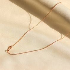 14K Rose Gold Rolo Chain Necklace, Rose Gold Rope Chain, Rose Gold Jewelry Features :  -Gold KT: 14K Solid Gold -Gold Color: Rose Gold -Chain Lengths: 14", 16", 18", 20", 22", 24" -Chain Width: 1 mm -Chain Style: Rolo Shipping:  -Ready to Ship in 1-2 Business Days -Packed in labeled gift box -The perfect birthday or holiday (Christmas, hanukah, valentines day...etc.) gift!  -FREE shipping on all U.S. orders  Contact us with any inquiries by Etsy convo : Want to find out more? Check out my shop h Classic Rose Gold Charm Necklace With Clavicle Chain, Delicate Rose Gold Cable Chain Necklace, Minimalist Rose Gold Charm Necklace With Cable Chain, Minimalist Rose Gold Necklace With Cable Chain, Classic Rose Gold Charm Necklace With Delicate Chain, Classic Rose Gold Chain Necklace With Delicate Chain, Dainty Rose Gold Necklaces With Chain, Dainty Rose Gold Chain Necklace, Classic Rose Gold Delicate Chain Necklace