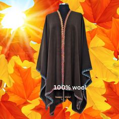 This eye catching embellished with hand work trim reversible cape is elegantly stylish,
The cape can be easily turned around because both sides are beautifully finished,
This Soft and warm Ruana, is a free-flowing wrap with an open front, similar to a large scarf. You can wear as a poncho long in front open, like a shawl, or throw one or both sides over your shoulder(s) for a more romantic or dramatic cape. Ruana Wrap, Etsy Clothes, Handmade Gifts Diy, Small Business Gifts, Girls Handmade, Large Scarf, Handmade Clothes, Comfortable Outfits, Shawls And Wraps