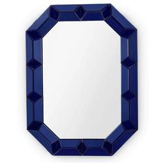 a mirror that is on the wall with some blue squares around it and an empty white background