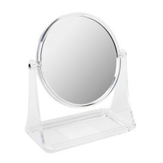 a clear vanity mirror sitting on top of a stand