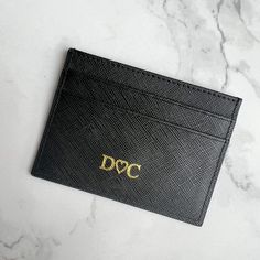 Specifications: 1.Outside material: PU leather. 2.Inside material: polyester. 3.Size: length 11cm - thickness 2.6cm - high/width 8cm. 4.Weight:95g. 5.The card wallet can put bank cards, credit cards, bus cards, subway cards, shopping cards, ID cards, bills, change, etc. Due to the difference in the measurement method, please allow 1-2cm in size deviation Elegant Rectangular Card Holder For Gift, Classic Black Card Holder For Personal Use, Classic Card Holder For Personal Use, Classic Gift Card Holder, Classic Rectangular Card Holder For Gifts, Classic Rectangular Card Holder Gift, Classic Rectangular Card Holder As Gift, Elegant Wallets With Rfid Blocking As Gift, Elegant Rfid Blocking Wallets As Gift