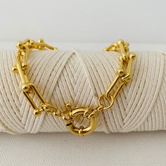 This bracelet is created with bold, gage links to make the perfect statement. It measures approximately 7.25 inches. Nautical, Gold Bracelet, Handmade Jewelry, Jewelry Design, Bracelet, Gold, Design, Handmade Jewellery, Nature