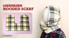 the hooded scarf is next to a sewing pattern on a mannequin's head