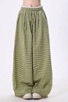 This Indie aesthetic checkered pants features a relaxed, baggy fit with an elastic waistband, designed with a green plaid pattern Girl Skirts