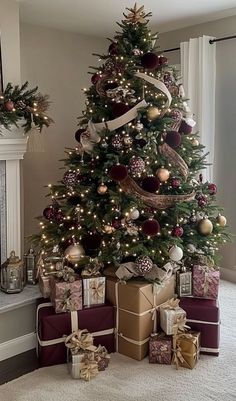 a decorated christmas tree with presents under it