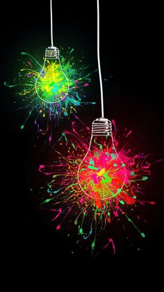 two light bulbs with colored paint splatters on them and one has a black background