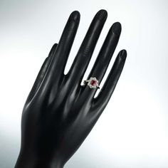 For Sale on 1stDibs - A ruby and diamond cluster ring, the oval faceted ruby estimated to weigh 0.65 carats, surrounded by eight old brilliant-cut diamonds estimated to weigh Ruby Diamond, Diamond Cluster Ring, Diamond Cluster, Cluster Ring, Brilliant Cut Diamond, Diamond Cuts, Ruby, Diamonds, Ring