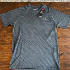 Brand New With Tags Men’s Medium Under Armour Heat Gear Tshirt. Under Armour Gray Crew Neck Top, Under Armour Short Sleeve Sports Shirt, Under Armour Shirts, Under Armour Men, Shirt Color, Under Armour, Tee Shirts, Mens Shirts, Heat