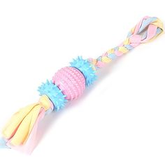 a toothbrush with colorful hair on it's head and blue, pink, yellow and white bristles