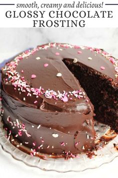 a chocolate frosted cake with sprinkles on it and the words globsy chocolate frosting