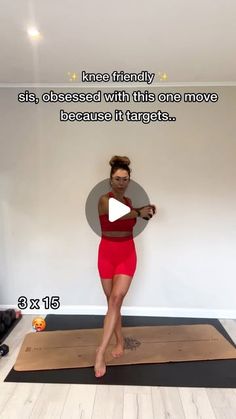 a woman standing on a yoga mat in front of a white wall with words above her