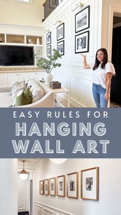 a woman standing next to a living room with pictures on the wall