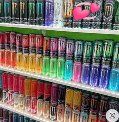 the shelves are filled with many different colored cans