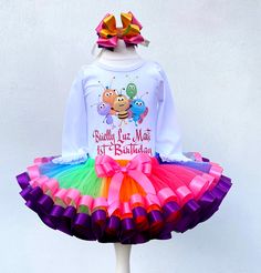 I offer you a beautiful birthday tutu outfit girls. NOTES FOR THE SELLER -Number for personalizing the top. -Name to personalize the vertex. -Need by date. Sleeve for the top - short, long. TOP. The top of it is 100% cotton. Size 3-24 months it is a bodysuit, 2T-10T it is a shirt. (Since it is more handmade always remember the shirt needs to be washed inside out, hand washed and air dried). SKIRT - made of soft tulle, edged at the bottom with a ribbon and decorated with a bow. Tutu is planted on Playful Purple Tutu Dress For Birthday, Fun White Tutu Dress For Birthday, Playful Tulle Tutu Dress For Birthday, Fitted Ruffle Tutu Dress For Birthday, Fitted Ruffled Tutu Dress For Birthday, Playful White Tutu Dress For Birthday, Fun Tulle Tutu Dress For Birthdays, Cute Purple Tutu Dress For Birthday, Cute Fitted Tutu Dress For Birthday