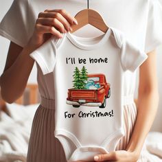 Celebrate the joy of being together with our charming ‘I’ll Be Home for Christmas’ baby outfit! Perfect for little ones spending their first holiday season with family, this cozy and festive design captures the magic of coming home for Christmas. Made from soft, comfortable fabric, it’s ideal for holiday gatherings, family photos, or cozying up by the tree. Whether it’s for a family reunion or simply sharing in the love and warmth of the season, this adorable outfit is a perfect way to mark the special occasion of being home for the holidays. This baby bodysuit is machine washable, making it easy to care for. The romper is super soft and easy to wear and take off, with a snap closure. This bodysuit is designed and created by a mom who is passionate in creating playful, cute, and trendy des Birthday Baby Announcement, Coming Home For Christmas, First Christmas Baby, Baby Christmas Outfit, Christmas Cute, Home For Christmas, Festive Design, Baby Outfit, Food Humor