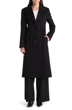 Fashioned from luxe Italian wool, this longline coat is the perfect way to elevate your outerwear portfolio. 47"length(size 8) Notched collar Back vent 100% acetate lining 100% wool Dry clean Made in the USA of imported fabric Long Single-breasted Wool Coat For Office, Elegant Long Solid Wool Coat, Elegant Black Wool Coat With Concealed Placket, Elegant Wool Coat For Formal Occasions, Elegant Formal Solid Wool Coat, Single Breasted Wool Outerwear For Evening, Winter Evening Wool Coat With Hidden Button Closure, Single-breasted Wool Outerwear For Evening, Winter Wool Coat With Hidden Button Closure For Evening