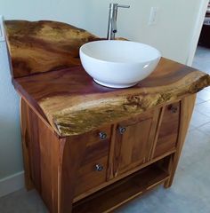 a bowl sitting on top of a wooden counter