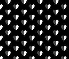 black and white hearts are arranged in the shape of heart shapes on a black background