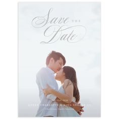 the save the date photo card is shown with an image of two people kissing each other