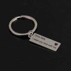 a keychain that says one side i need you here with me