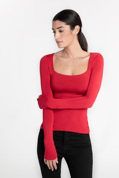 Meet Yvonne, our do-it-all top appropriate for any occasion. She features a hypnotic square neckline and long sleeves for that edgy touch, with a double layer of our silky, high-stretch and sustainable European jersey lining the chest area providing additional support. Sexy and sophisticated at once, Yvonne's ready to tag along for anything. [SPLIT] Sam is 5'8" (173 cm) tall, wearing size XS. Total length approximately 25" (64 cm). Sustainable European Jersey (96% Tencel, 4% Elastane). Turn Garm Extra Long Sleeves, Red Long Sleeve, Viscose Fabric, Jersey Top, Square Neckline, Black Long Sleeve, Abercrombie Fitch, Double Layer, Winter Outfits