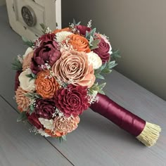 a bridal bouquet on a wooden table