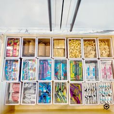 a drawer filled with lots of different types of snacks