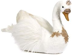 a white swan stuffed animal with gold decorations on its head and neck, sitting in front of a white background