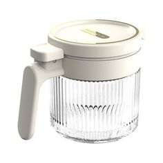 a glass coffee pot with a lid and handle on the top is shown in front of a white background