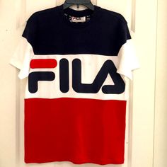 Great Crewneck T-Shirt By Fila! In Classic Red White And Blue With Vibrant Logo Detail, This T-Shirt Has Great Sporty Style! The Bottom Red And Upper Blue Panels Are Sewn Onto The White Logoed Insert Across The Chest. Size Small (Armpit To Armpit: 21” Length: 27.5”) And Size Large (Armpit To Armpit: 23” Length: 29”) Available. New With Tags! Red Shirts For Men, Red Shirt Men, Red Shirts, Fila Shorts, Red And Black Shirt, Blue Panels, Black Activewear, Mens Tee Shirts, Red Shirt