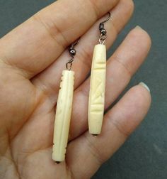 Carved bovine bone formed into a bead. It has a 925 plated silver french hook. If you would like to continue shopping for decorative bone items, wood paintings, and other rustic home décor, you may continue shopping by clicking this link, https://etsy.com/shop/CreativeWorkByAnnie Bohemian Bone-colored Nickel-free Earrings, Unique Bone-colored Nickel-free Earrings, Unique Carved Bone Jewelry, Unique Bone-colored Carved Jewelry, Traditional Bone-colored Jewelry Gift, Traditional Bone-colored Jewelry As A Gift, Handmade Artisan Bone-colored Jewelry, Bohemian Bone-colored Pierced Earrings, Bohemian Bone-colored Earrings